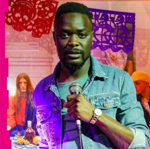 Photo of Nelson holding a mic with collage background.